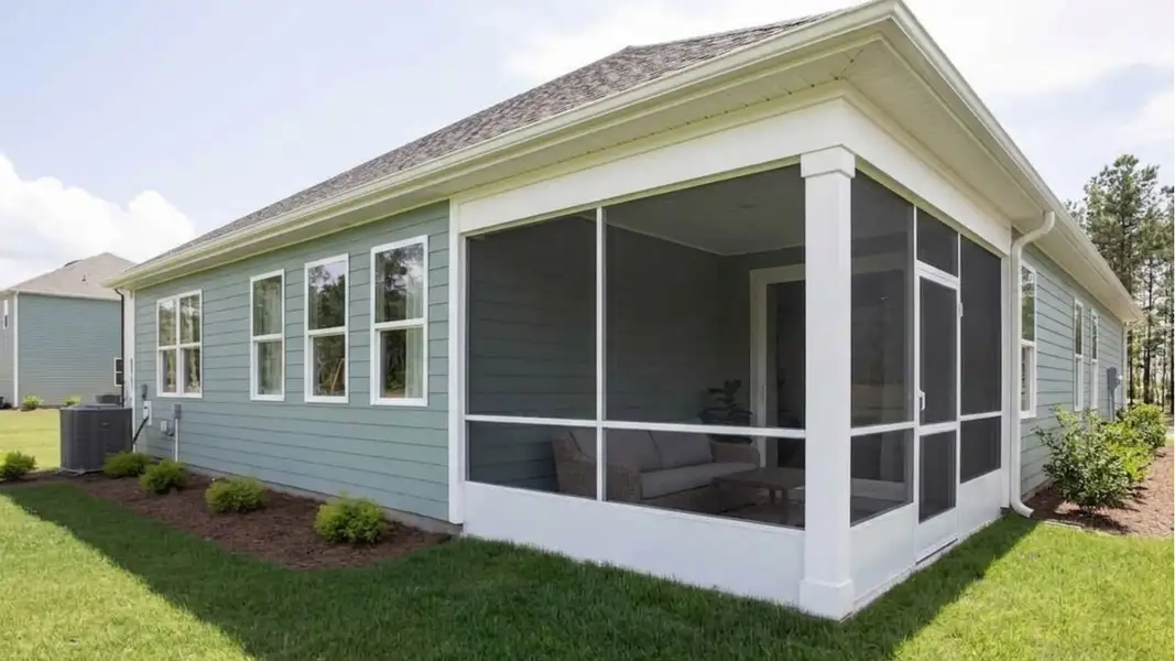 Exterior details and patio area of a home in The Haven at Indigo Preserve, Leland (Image 3).