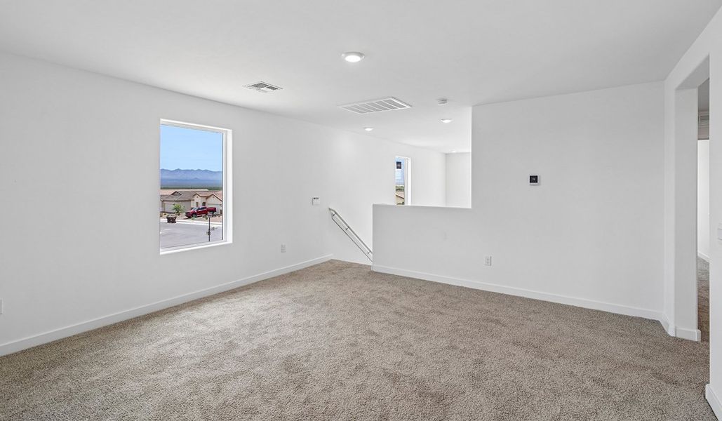 Spacious, unfurnished interior of a new home in The Oasis at Rocking K, Vail (Image 18).