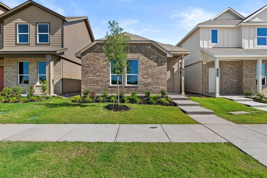 Front exterior of a new home in Orchard Village, Fort Worth, TX, highlighting curb appeal (Image 2).