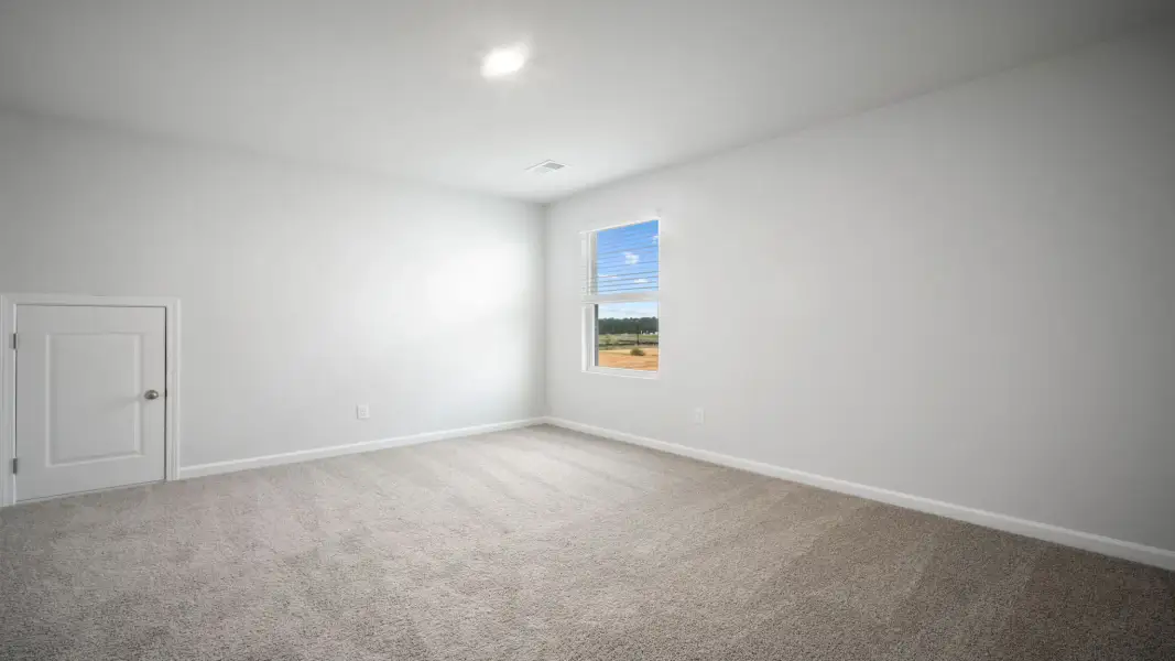 Spacious, unfurnished interior of a new home in The Retreat at East Argent, Ridgeland (Image 32).