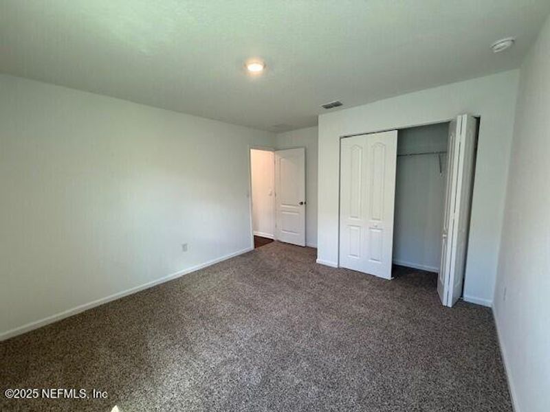 Spacious, unfurnished interior of a new home in Grand Reserve, Bunnell (Image 22).