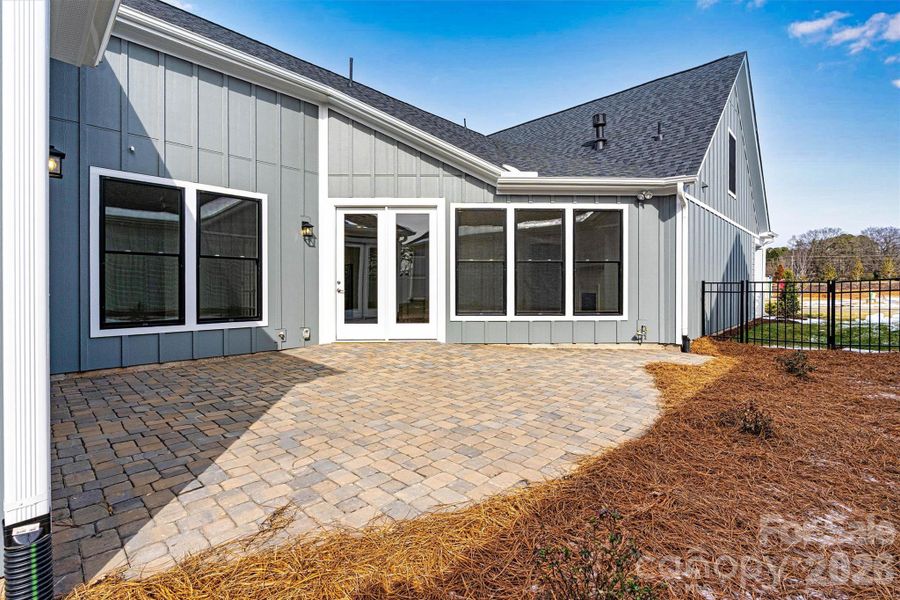 Exterior details and patio area of a home in The Courtyards at Lake Davidson, Mooresville (Image 3).