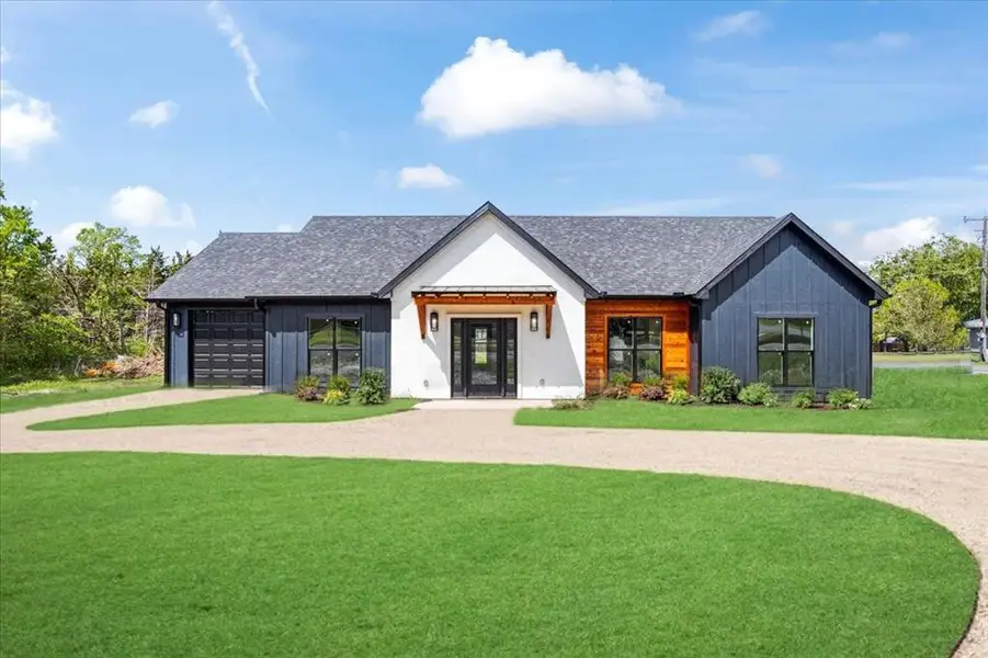 Driveway and grass are renderings