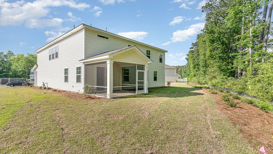 Representative exterior photo of a completed home built from the HARBOR OAK by D.R. Horton in Haven View, Murrells Inlet, SC (Image 20).