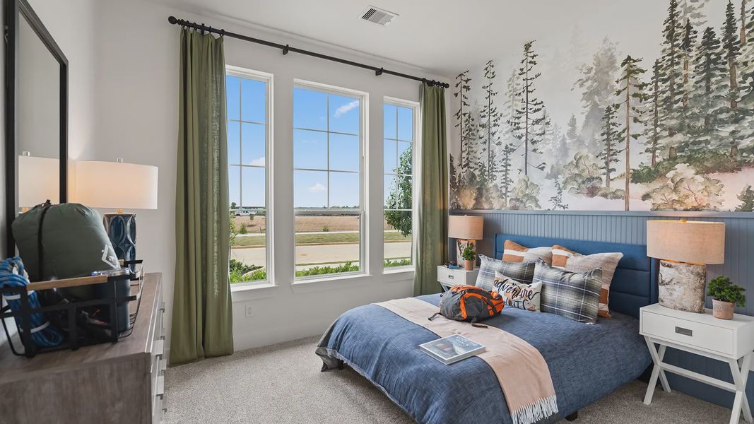 Representative furnished interior of a home built from the Hillcrest by Chesmar Homes in Artavia, Conroe (Image 16).