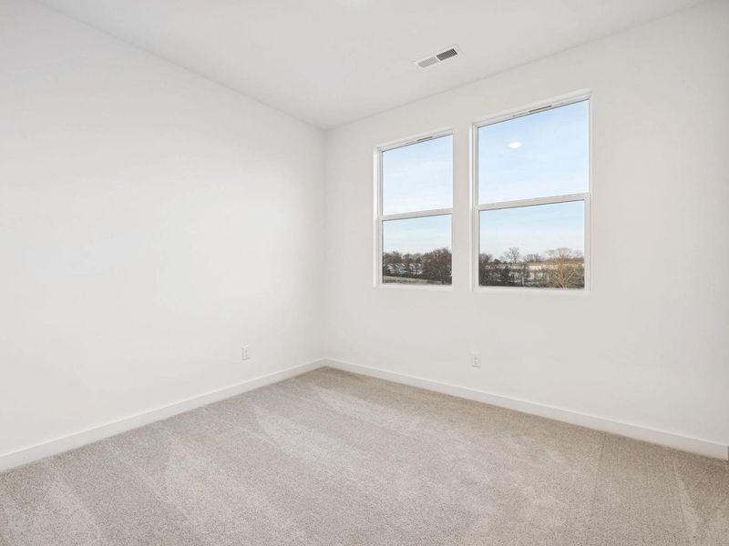 Spacious, unfurnished interior of a new home in Calista Farms, White House (Image 24).