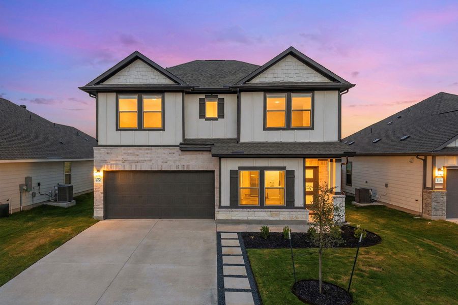 An elegant exterior showcases modern architectural design, clean trim lines, and a warm welcoming entry. An elegant exterior showcases modern architectural design, clean trim lines, and a warm welcoming entry.