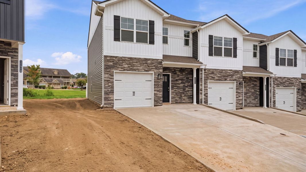 Front exterior of a new home in The Arbor Townhomes, Kingsport, TN, highlighting curb appeal (Image 2).