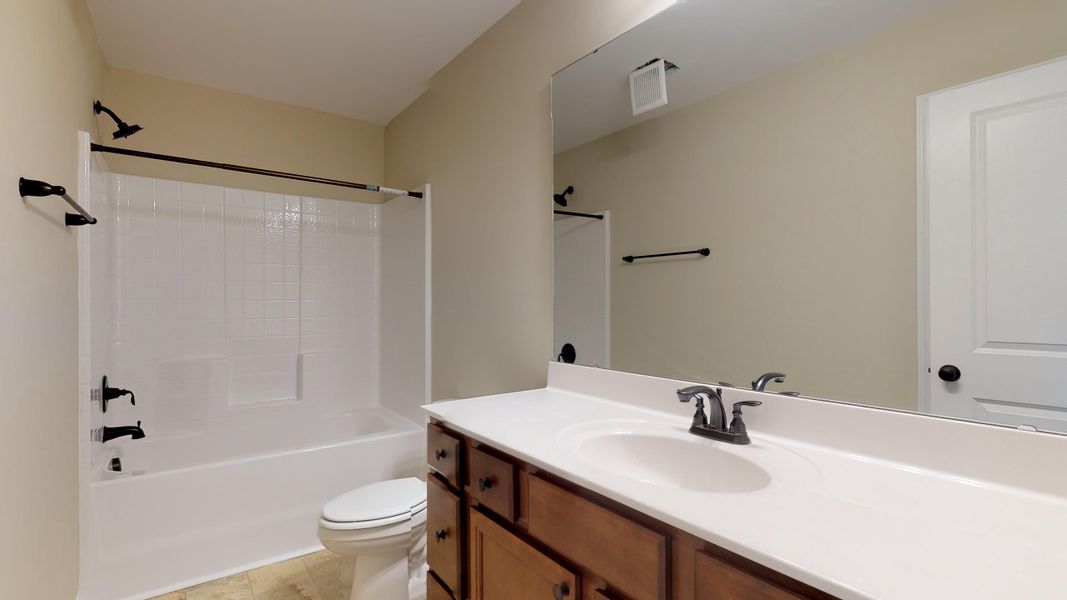 Representative furnished interior of a home built from the Rockbridge by Bill Clark Homes in Davenport Farms, Winterville (Image 16).