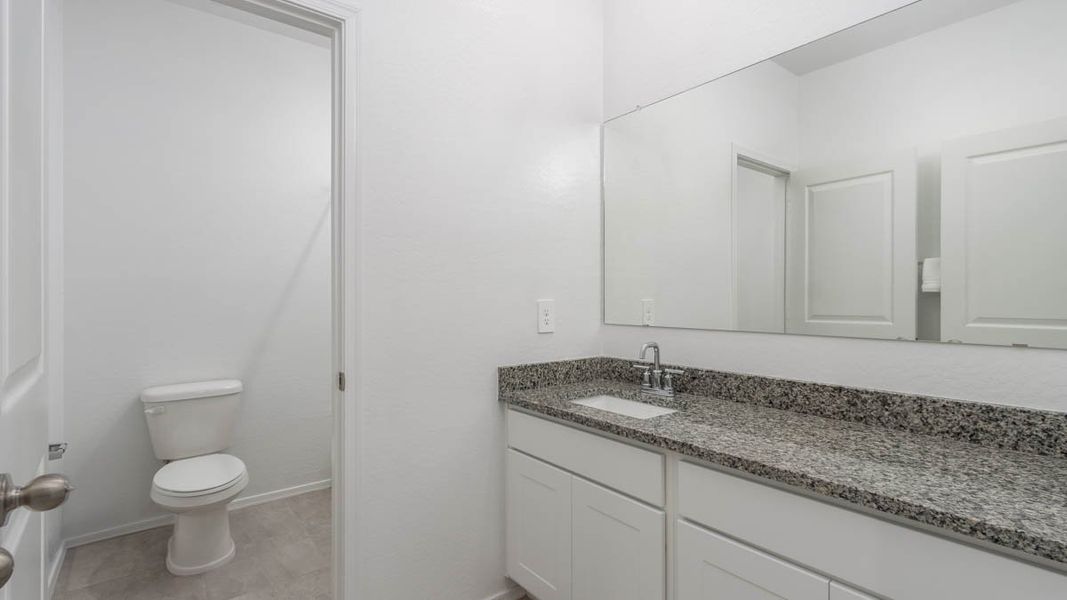 Representative furnished interior of a home built from the Holden by D.R. Horton in Carlton Commons, Casa Grande (Image 13).