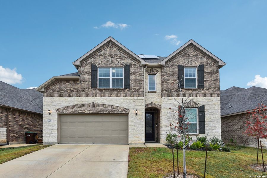Front exterior of a new home in Davis Ranch, San Antonio, TX, highlighting curb appeal (Image 23).