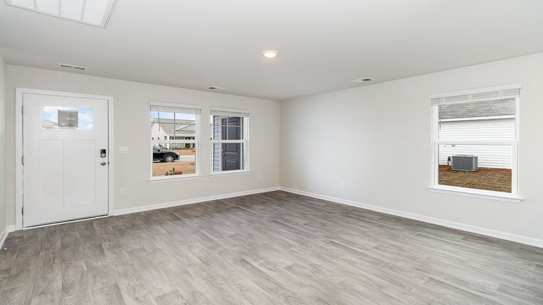 Spacious, unfurnished interior of a new home in Sandpiper Place, Myrtle Beach (Image 6). Spacious, unfurnished interior of a new home in Sandpiper Place, Myrtle Beach (Image 6).