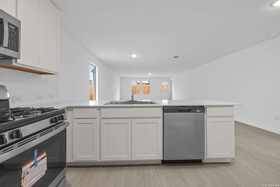Furnished interior view inside a new home in Voss Farms, New Braunfels (Image 4).