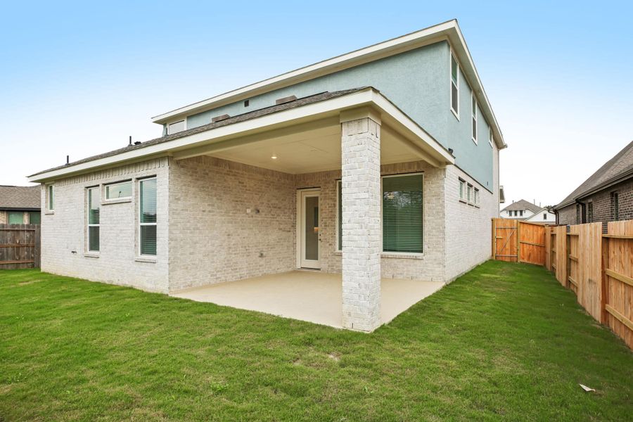 Exterior details and patio area of a home in The Trails, New Caney (Image 30).