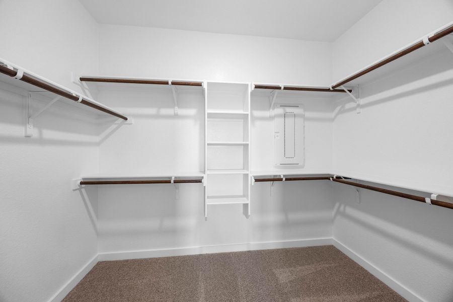 Primary Closet in the Magnolia home plan by Trophy Signature Homes – REPRESENTATIVE PHOTO Primary Closet in the Magnolia home plan by Trophy Signature Homes – REPRESENTATIVE PHOTO