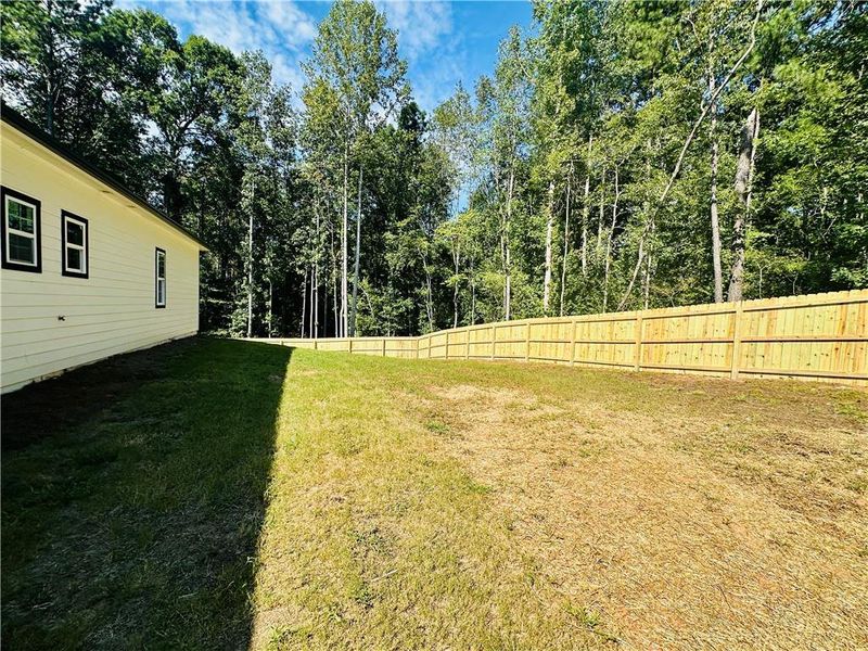 Front exterior of a new home in , Covington, GA, highlighting curb appeal (Image 18).