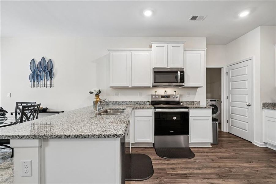 Furnished interior view inside a new home in Champion's Run, Lithonia (Image 9).
