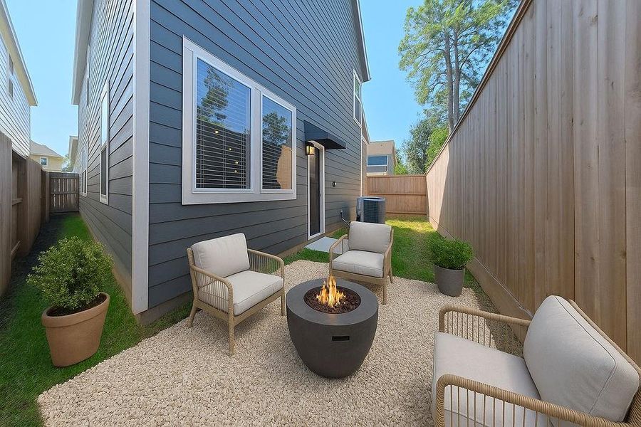 Cozy backyard patio surrounded by privacy fencing - has so much potential. Cozy backyard patio surrounded by privacy fencing - has so much potential.