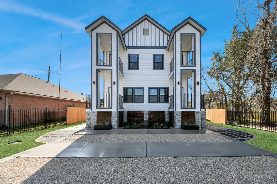 Front exterior of a new home in , Houston, TX, highlighting curb appeal (Image 32).