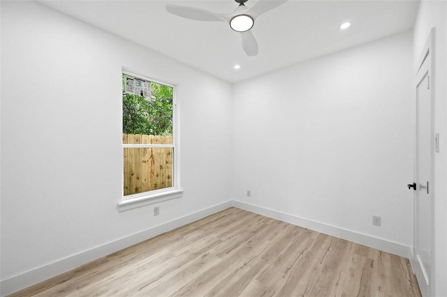 Secondary bedroom room with recessed lighting, and a ceiling fan Secondary bedroom room with recessed lighting, and a ceiling fan