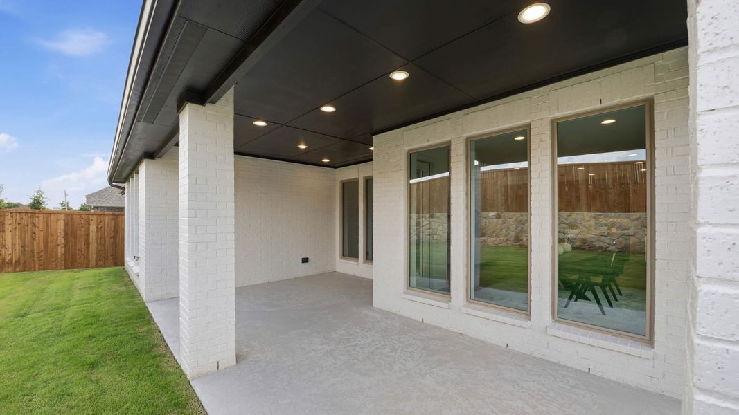 Exterior details and patio area of a home in The Heights at Uptown Celina, Celina (Image 4).