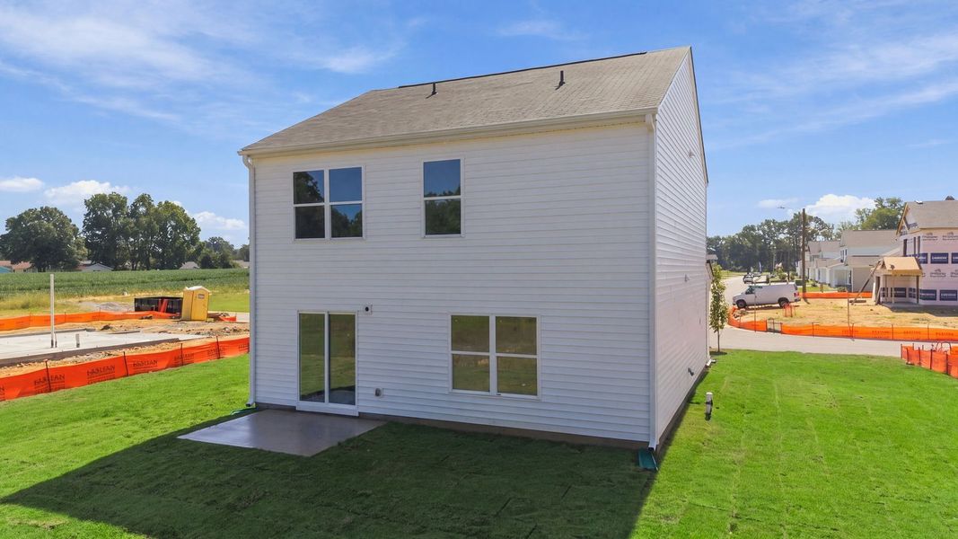 Exterior details and patio area of a home in Hobbs Farm, Ayden (Image 20).