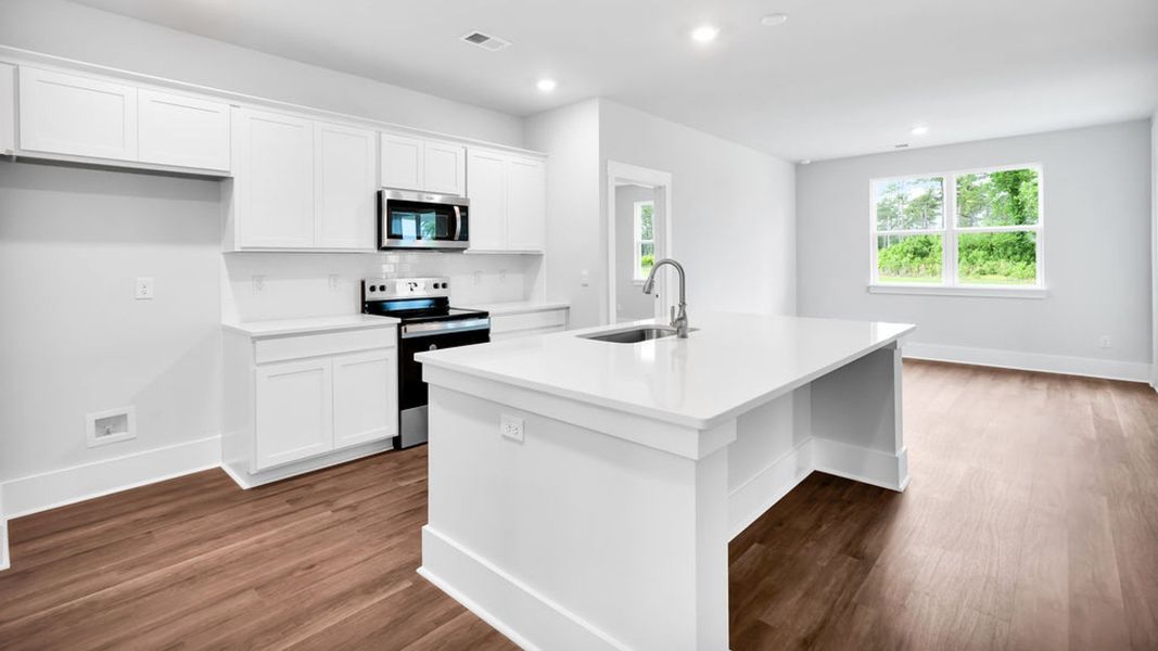 Furnished interior view inside a new home in Magnolia Ridge at Blake Farm, Wilmington (Image 6).