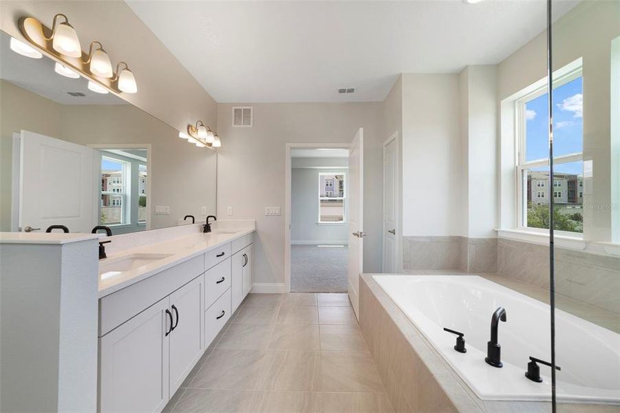 Furnished interior view inside a new home in Gatherings® of Lake Nona, Orlando (Image 5).