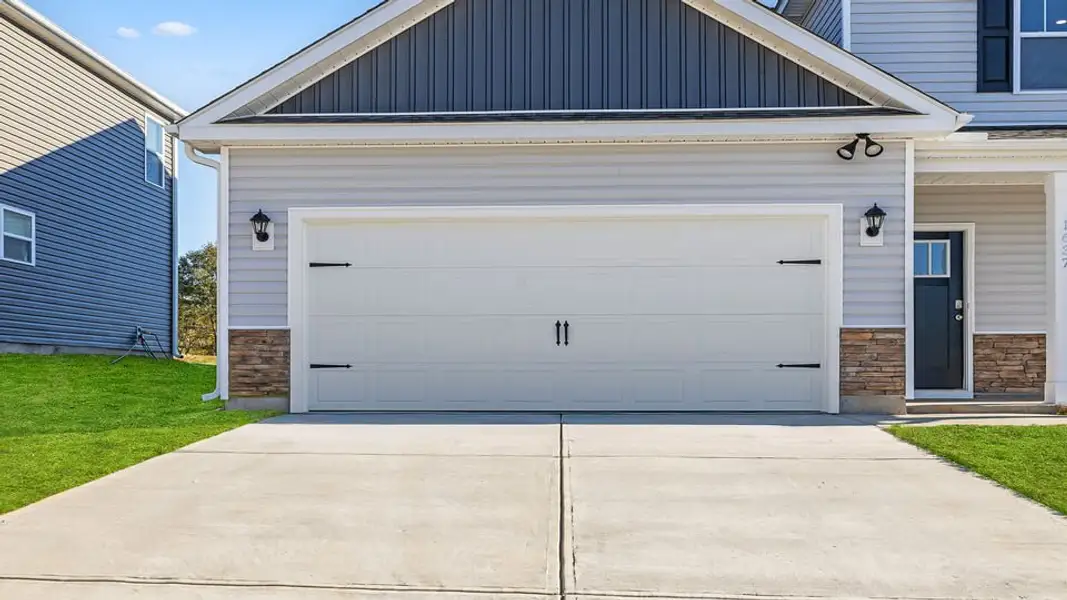 Exterior details and patio area of a home in Sherwood Gardens, Landrum (Image 3).