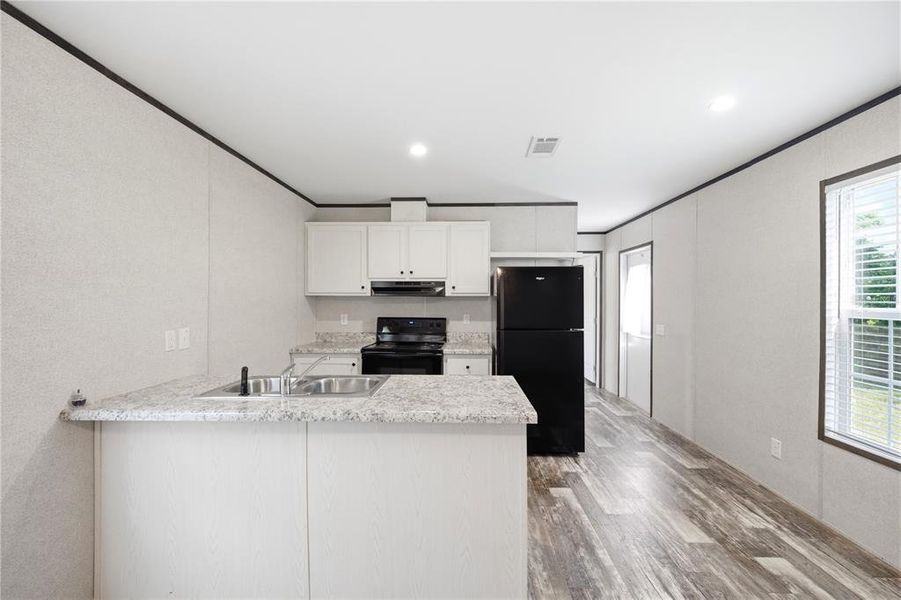 Furnished interior view inside a new home in , Brooksville (Image 13).