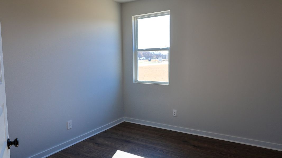 Representative unfurnished interior of a home built from the TISDALE by D.R. Horton in Harvest Point, Spring Hill (Image 42).