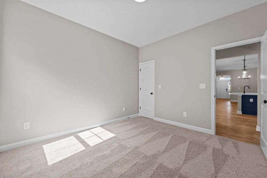 Representative unfurnished interior of a home built from the Weymouth by Caviness & Cates Communities in Bartlett Manor, Youngsville (Image 69).