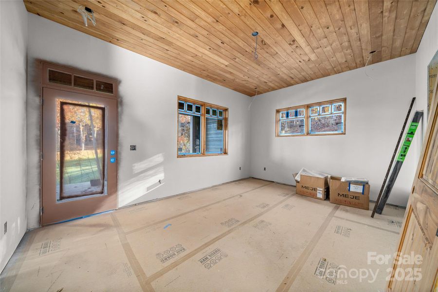 Primary access to back porch with golf course views.