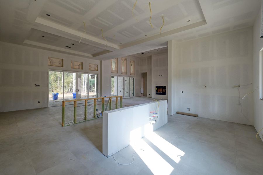 An inviting space anchored by natural light—perfect for everyday meals or gatherings that flow effortlessly into the outdoors.