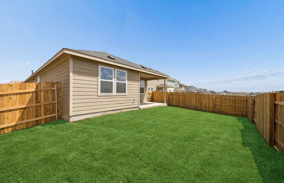 Exterior details and patio area of a home in Sunfield, Buda (Image 18).