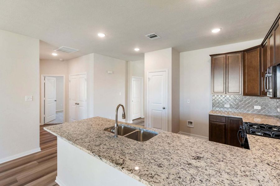 2D floor plan layout for the The 1443 by Stylecraft Builders in Sterling Ridge, Huntsville, TX (Image 12).