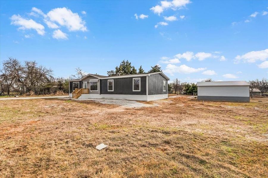 Exterior details and patio area of a home in , Joshua (Image 21). Exterior details and patio area of a home in , Joshua (Image 21).