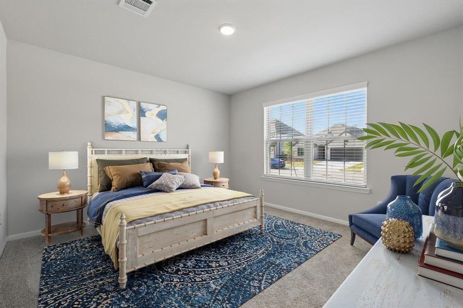 Carpeted bedroom featuring baseboards Carpeted bedroom featuring baseboards