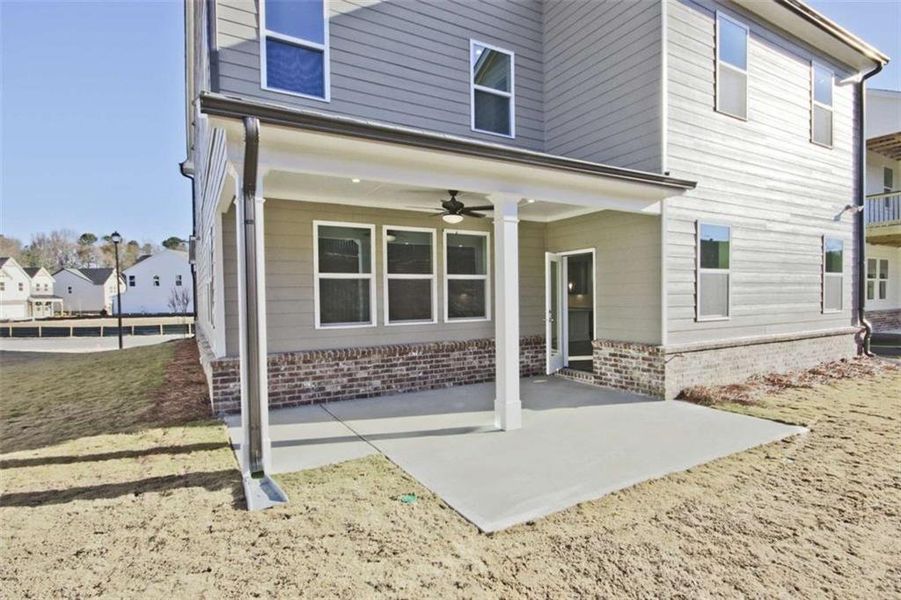 Exterior details and patio area of a home in The Paddocks at Doc Hughes, Buford (Image 4).