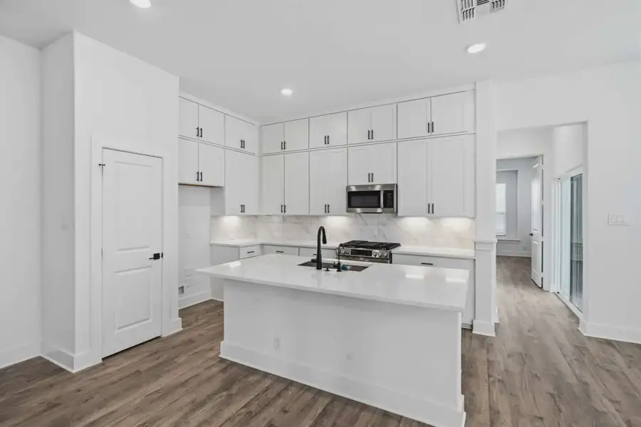 Representative furnished interior of a home built from the Pegasus by Chesmar Homes in Prominence Urban, San Antonio (Image 3).