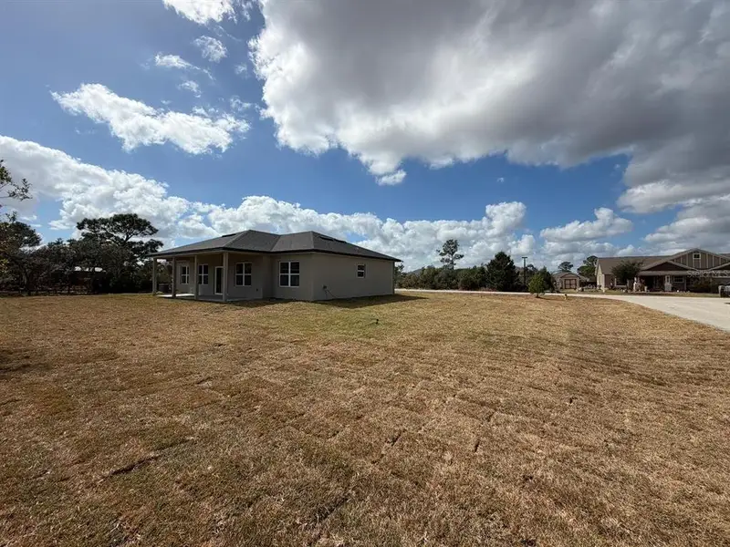 Exterior details and patio area of a home in , Sebring (Image 4).