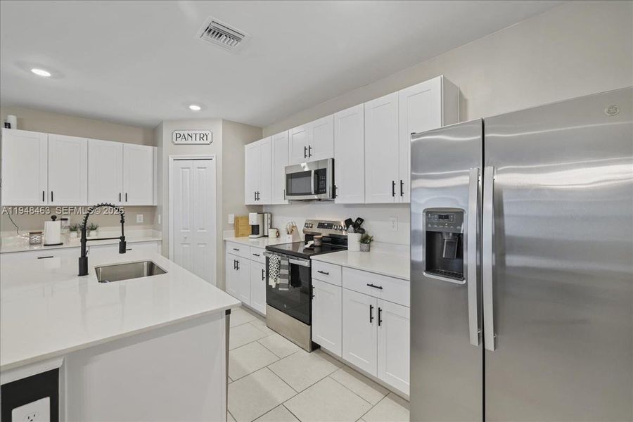 Furnished interior view inside a new home in , Lehigh Acres (Image 32).