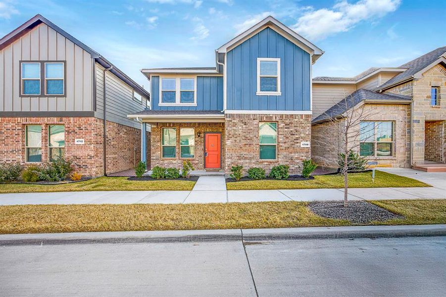 Front exterior of a new home in , Haltom City, TX, highlighting curb appeal (Image 17). Front exterior of a new home in , Haltom City, TX, highlighting curb appeal (Image 17).