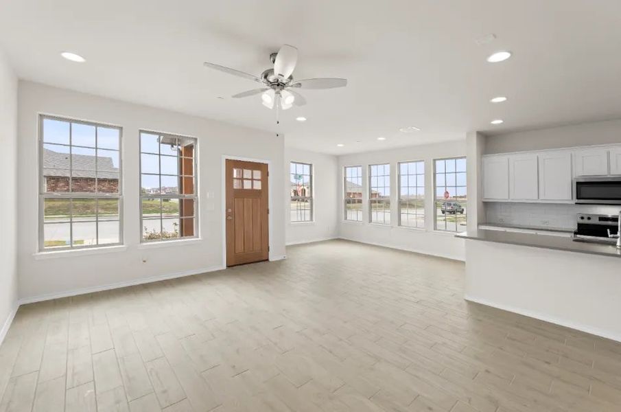 Front exterior of a new home in Sanger Circle, Sanger, TX, highlighting curb appeal (Image 6).