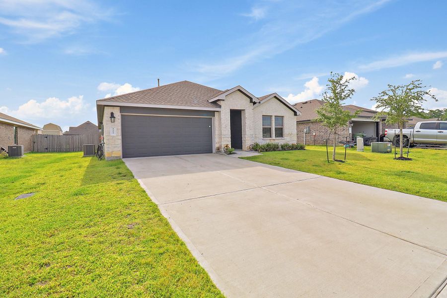 Front exterior of a new home in , Anahuac, TX, highlighting curb appeal (Image 19). Front exterior of a new home in , Anahuac, TX, highlighting curb appeal (Image 19).