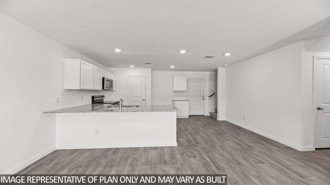 Furnished interior view inside a new home in Castles Edge, Willis (Image 5).