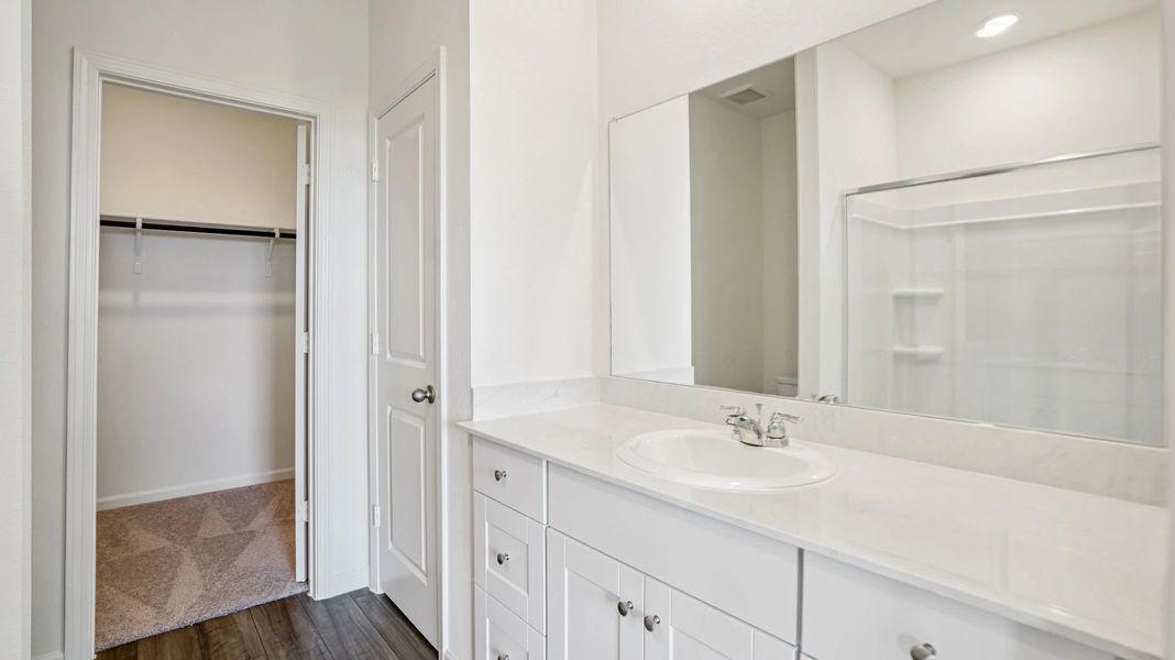 Representative furnished interior of a home built from the Athena by Starlight Homes in Creekview Fossil Ridge, Pilot Point (Image 12).