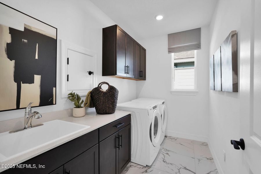 Furnished interior view inside a new home in Summer Bay at Grand Oaks, St. Augustine (Image 5). Furnished interior view inside a new home in Summer Bay at Grand Oaks, St. Augustine (Image 5).