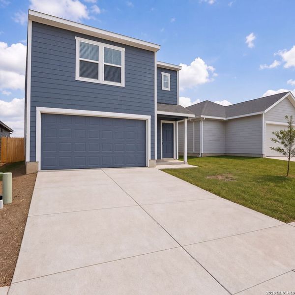 Front exterior of a new home in Landon Ridge, San Antonio, TX, highlighting curb appeal (Image 2).