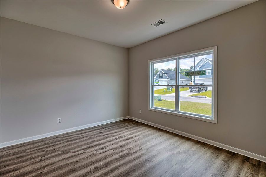 This versatile space features durable flooring and